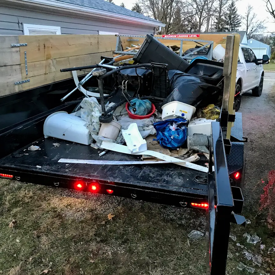 Roll-off dumpster delivered to a residential driveway in Beardstown